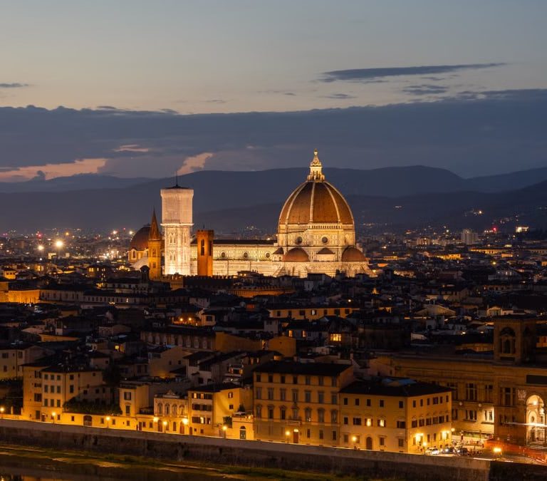 Captivating view of Florence's skyline featuring the iconic Duomo at twilight.